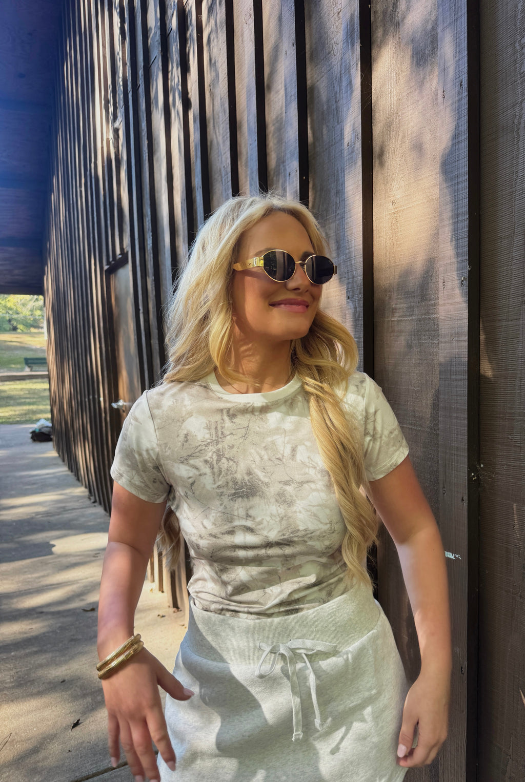 OUT OF THE WOODS BABY TEE